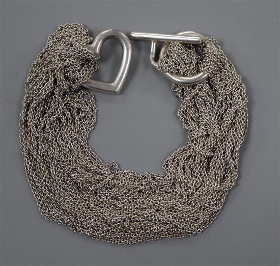 A Tiffany & Co sterling chain mesh link necklace with central heart motif,